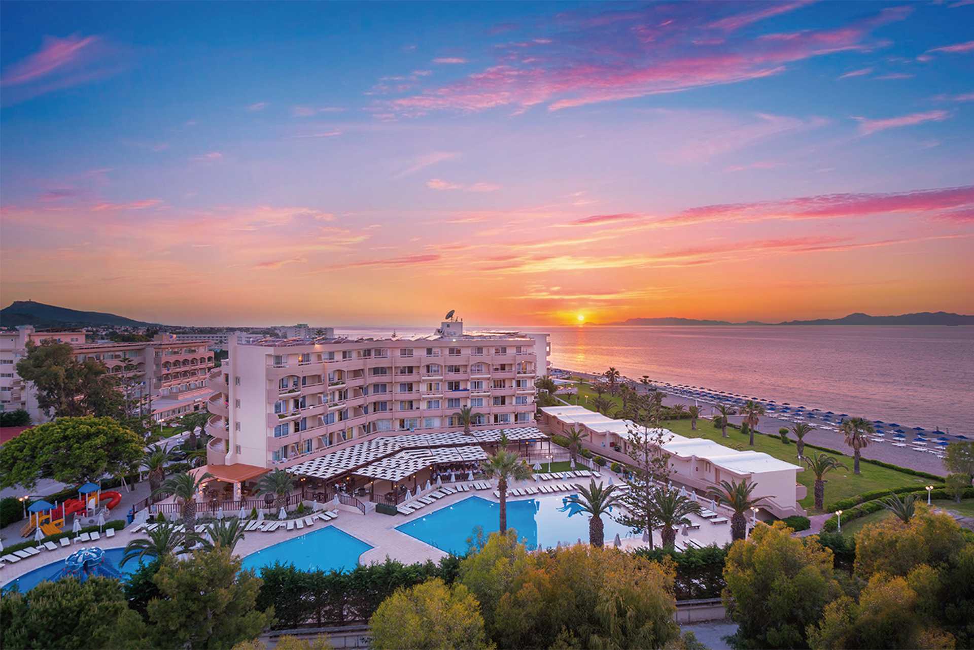 View of the hotel at sunset - Sun Beach Resort, Ialyssos, Rhodes, Greece