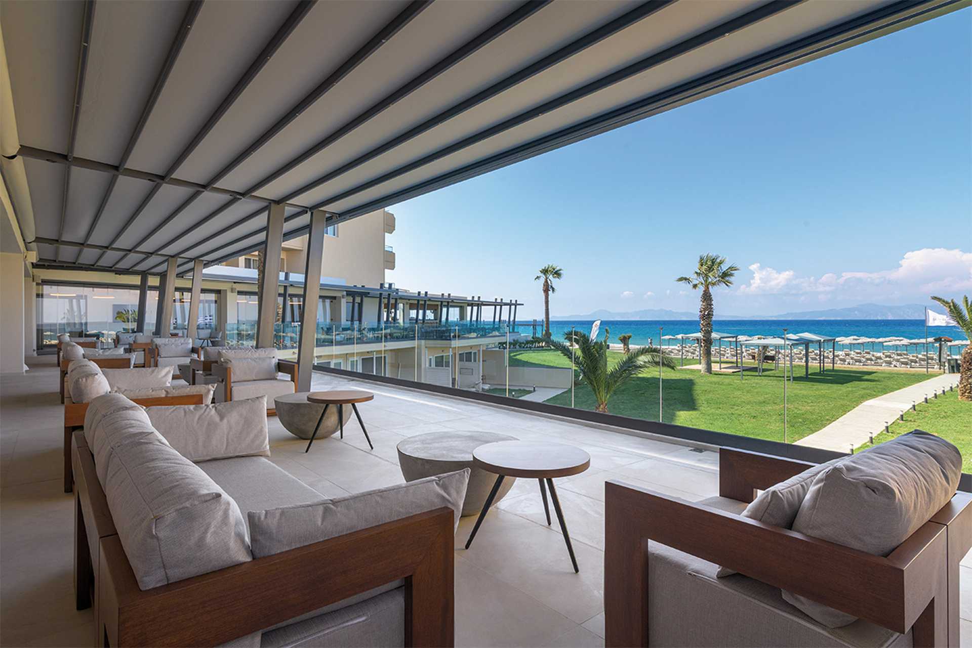 Lounge area with views of the sea - Sun Beach Resort, Ialyssos, Rhodes, Greece