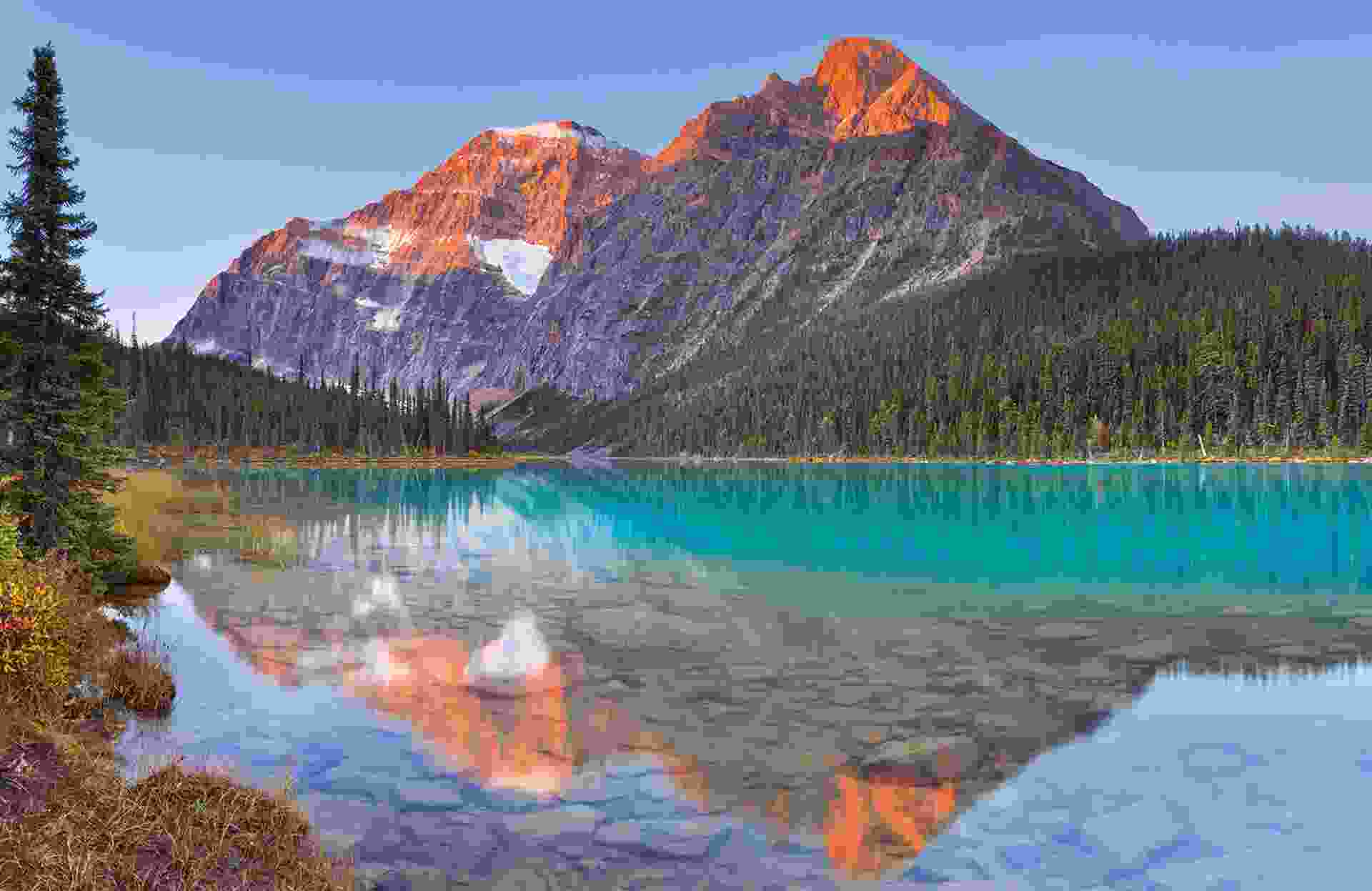 Mount Edith Cavell reflected in Cavell Lake in Jasper National Park, Canada
