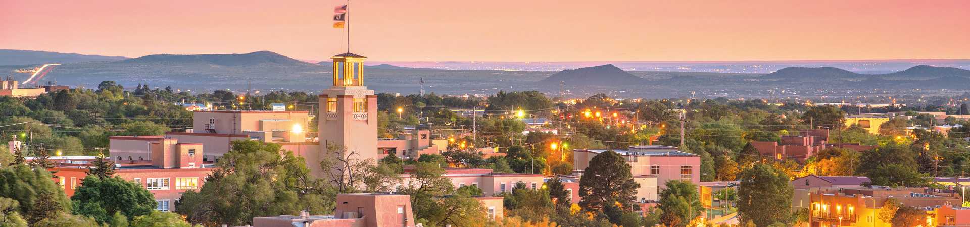 Santa Fe, New Mexico, USA downtown skyline at dusk.