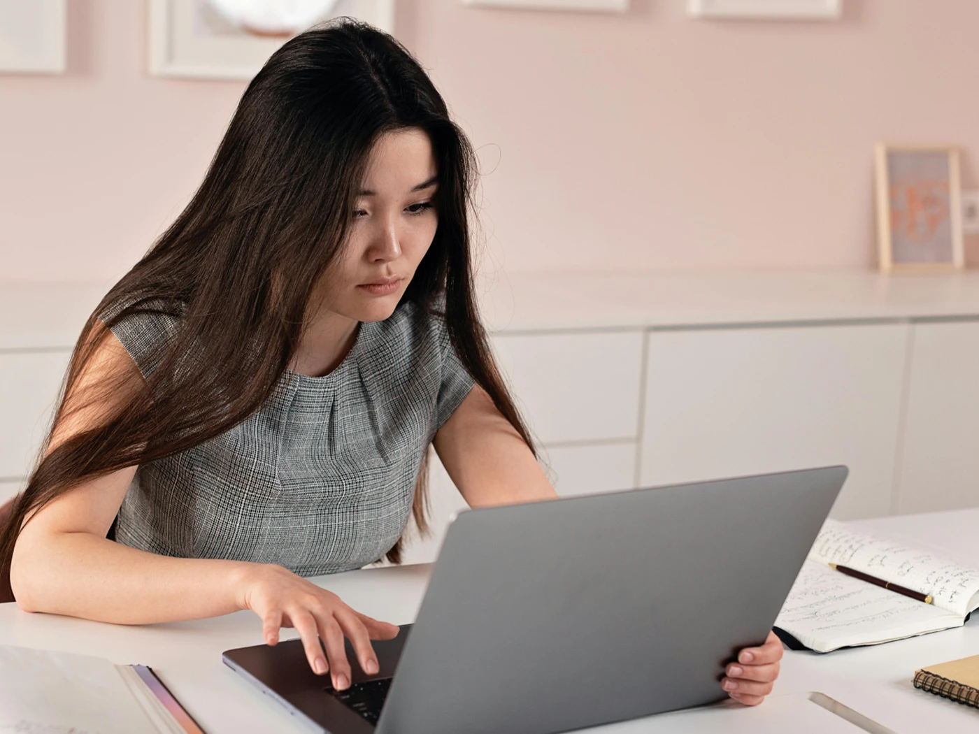 Manager looking at laptop
