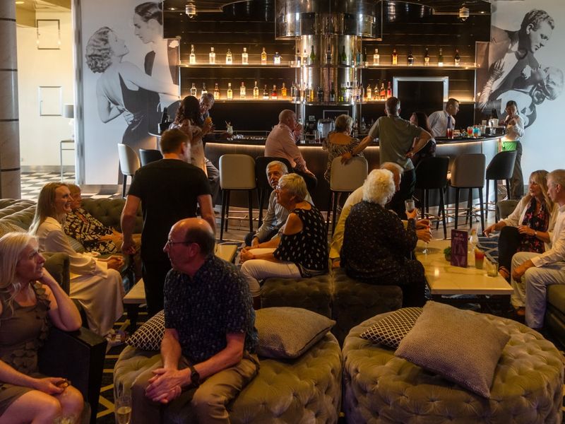 Groups of people socialising in  Raffle bar