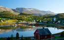 Characteristic small norwegian town near a fiord. Near Alta, Norway.