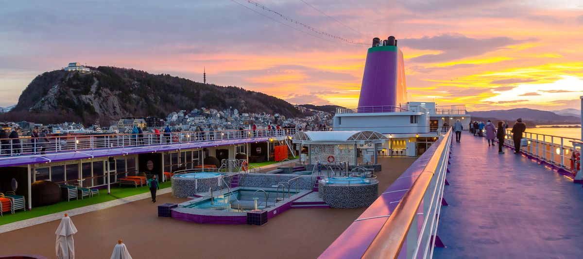 Sunset from the deck of the Ambition cruise ship in Alesund, Norway