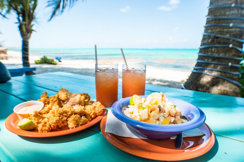 Conch fritters and conch salad with punch