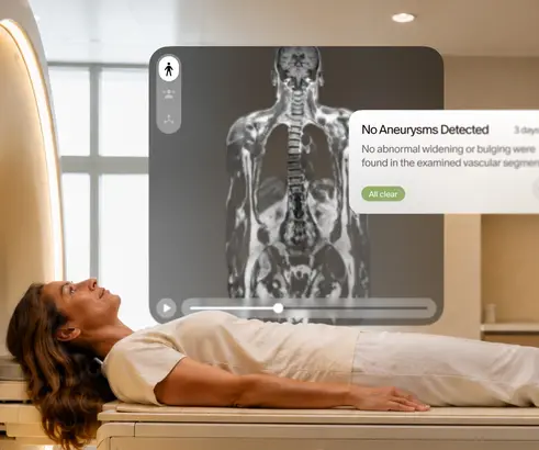 Patient in an MRI scanner beside a whole-body scan reading