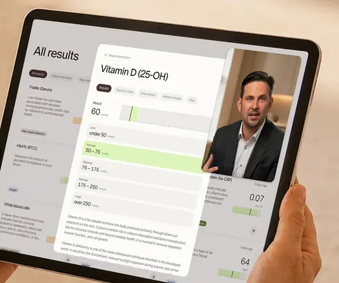 Tablet showing blood results next to a video call with a doctor