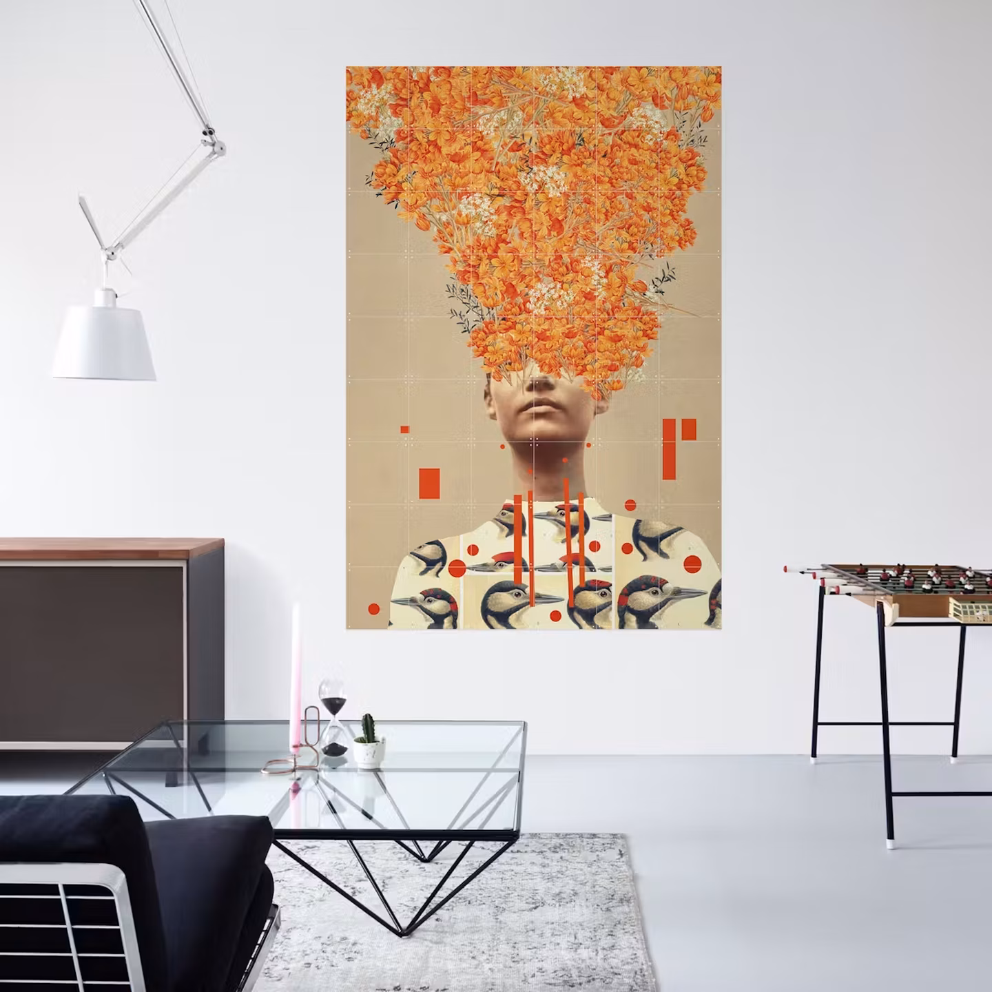 Large collage IXXI of a portrait with orange flowers in a bright interior with a glass table and a foosball table