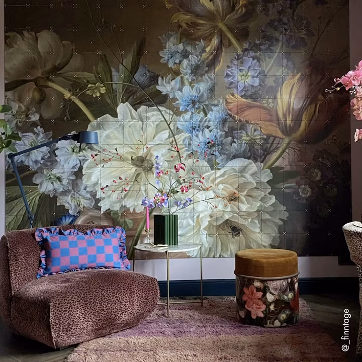 Flower still life with an alabaster vase, zoomed in and turned landscape across a whole wall behind an armchair