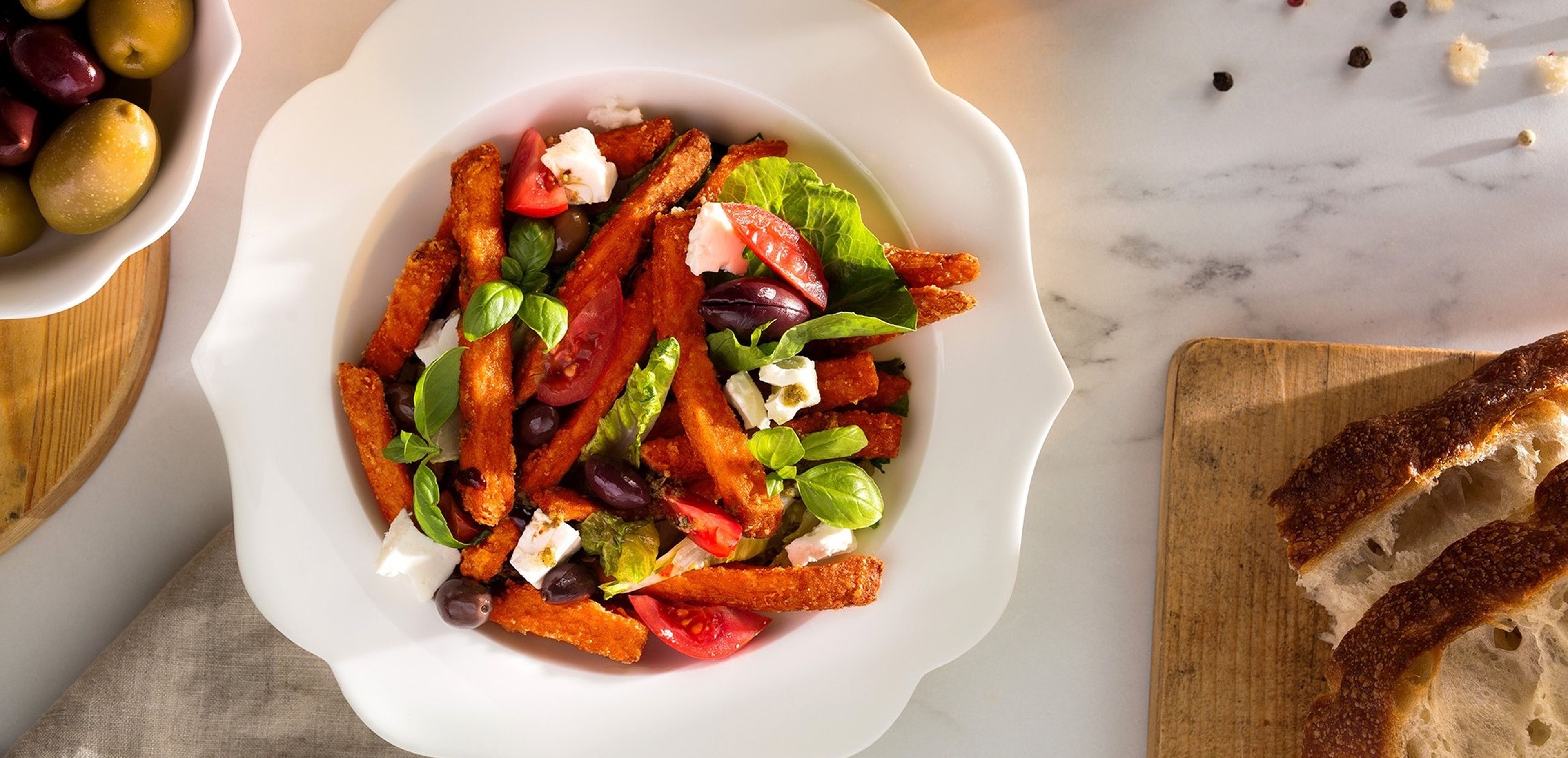 Salad with crispy Sweet Potato Fries and pistachios