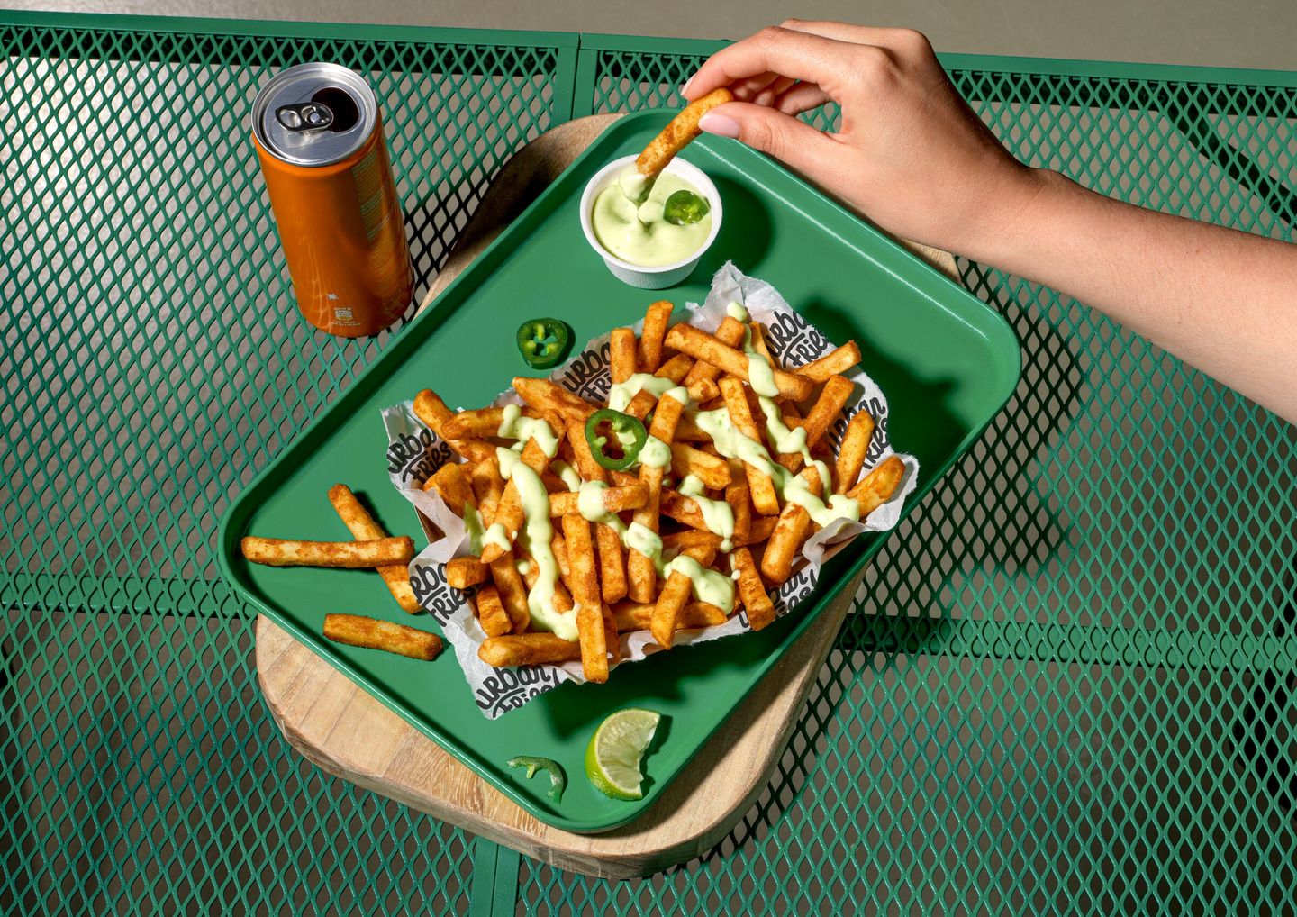 Urban Fries 10 mm Sauce Sweet and sour Jalapeño dressing hand landscape