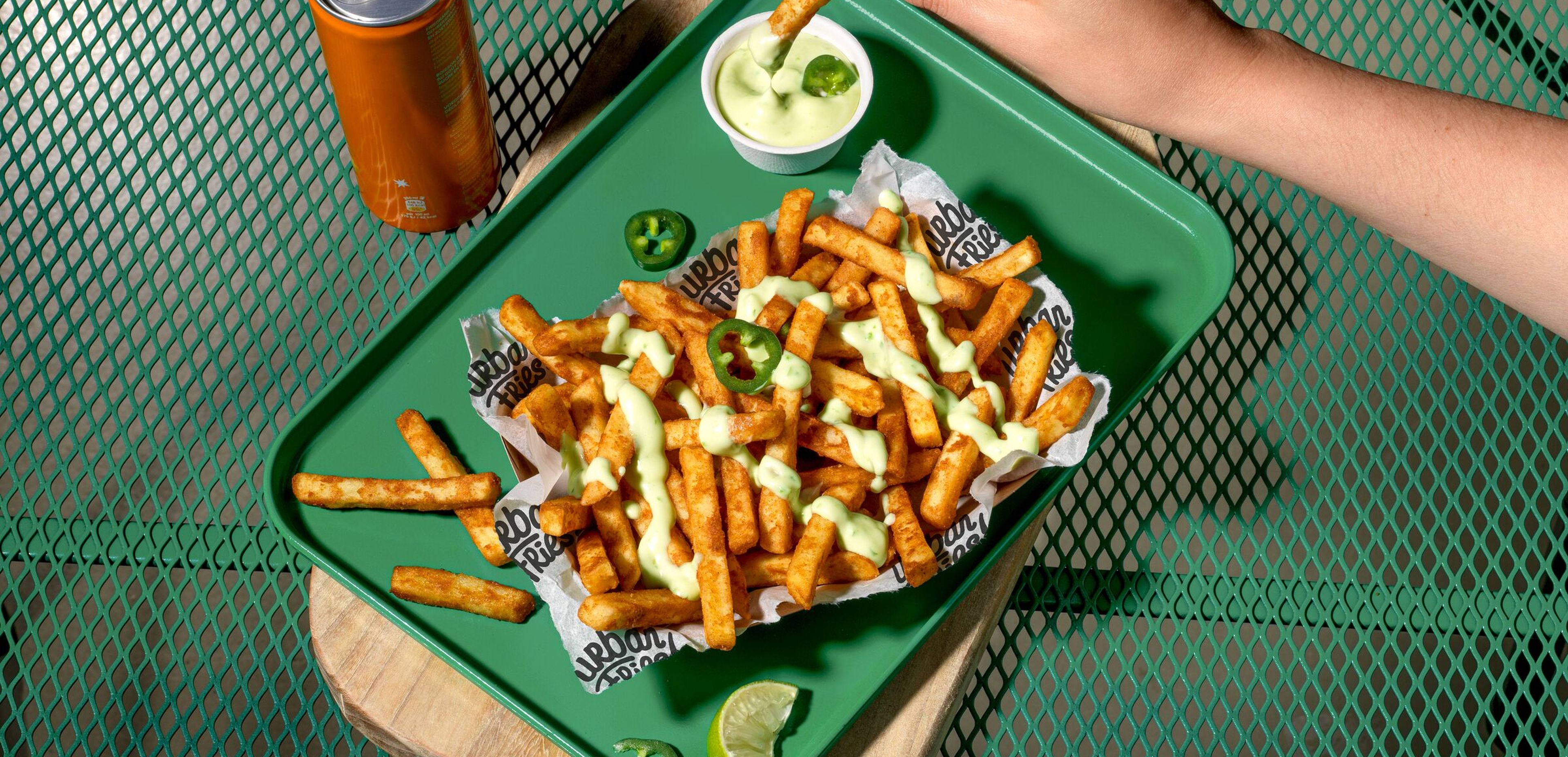 Urban Fries 10 mm Sauce Sweet and sour Jalapeño dressing hand landscape