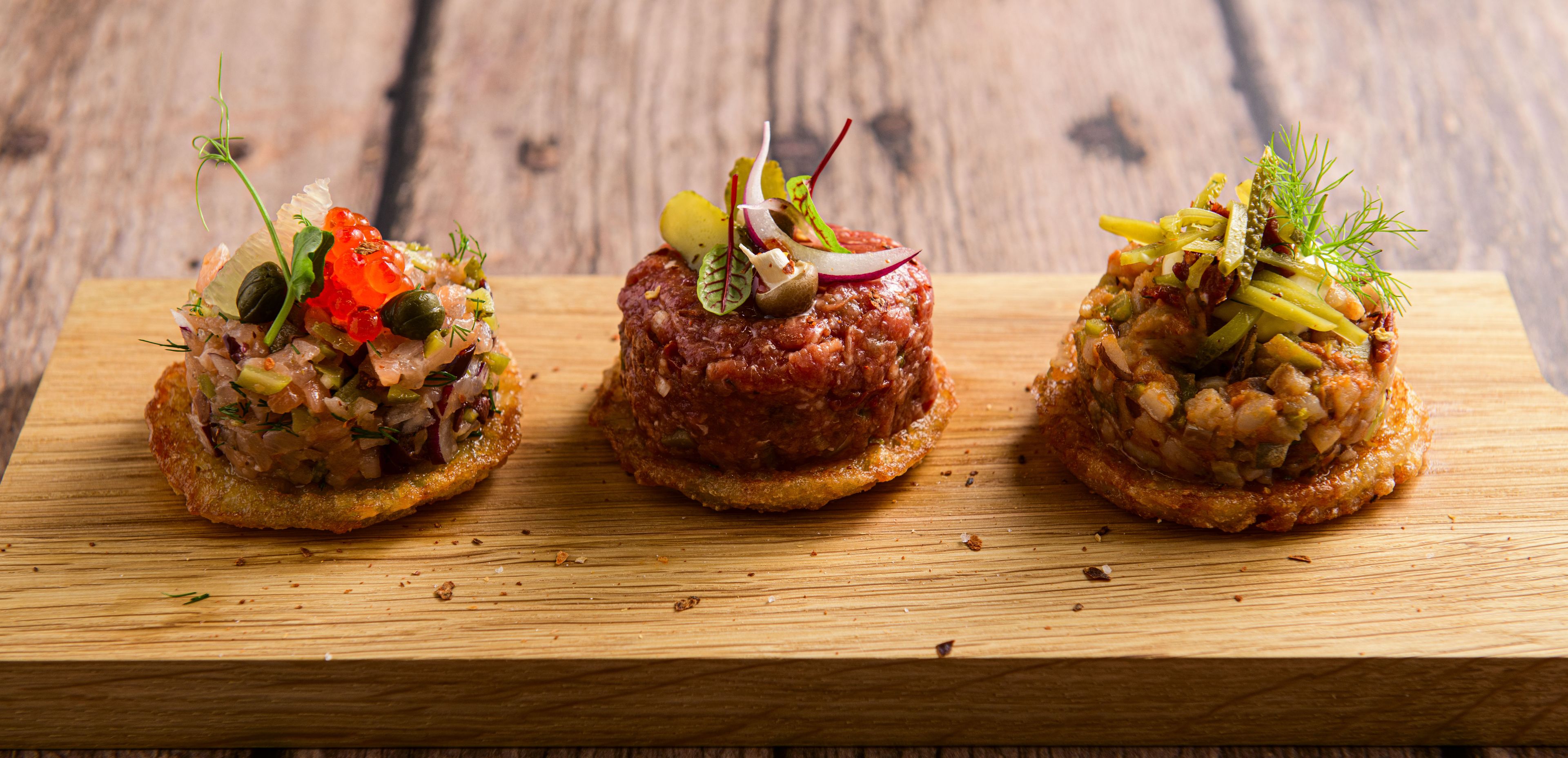 Mini Potato Pancakes with a Trio of Tartares: Salmon, Souses Herring and Beef