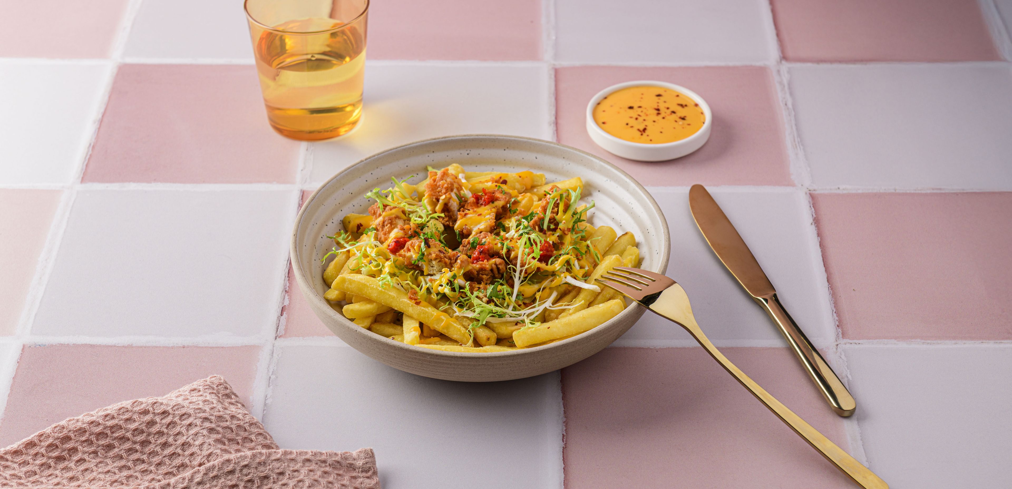 Loaded-Fries-with-Chicken-Strips-Lettuce-Cheese-Sauce-and-Crispy-Crumbs