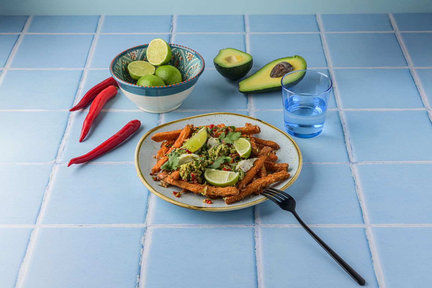 Loaded Fries with Sweet Potato Fries, Chili Salsa, Guacamole and Crème Fraîche