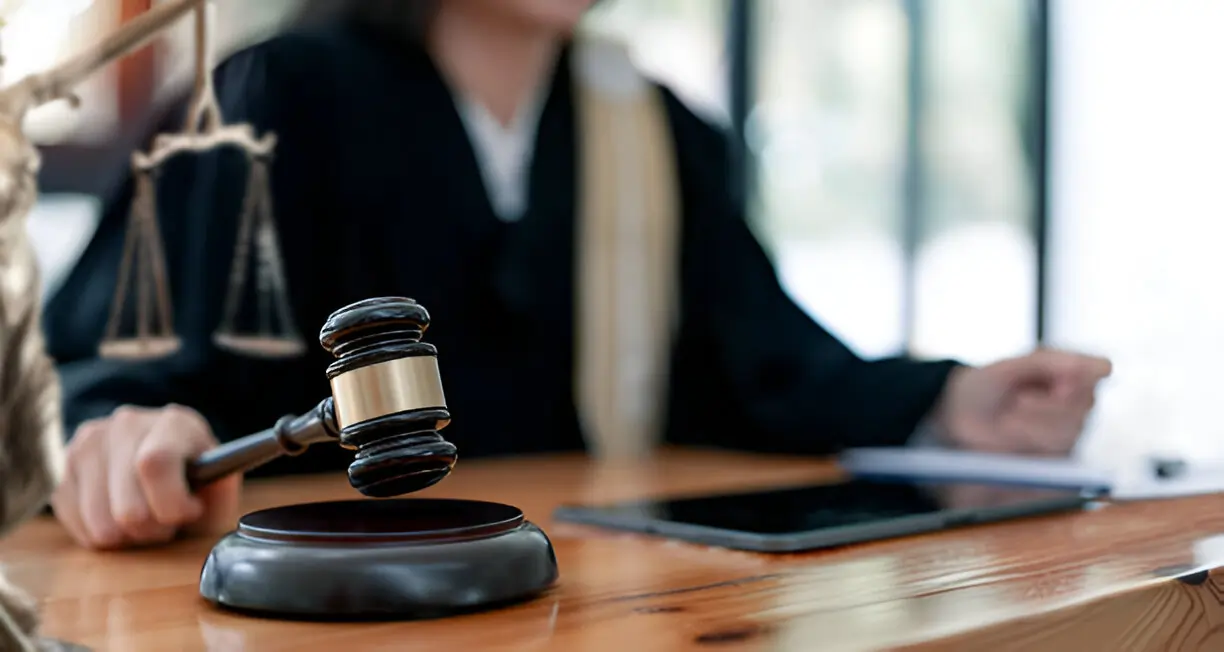woman judge hand holding gavel
