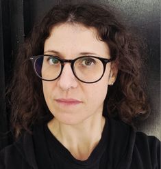 photo of woman looking at camera