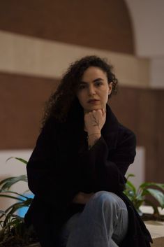 photo of woman looking at the camera