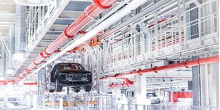 Audi is lifted in the production hall