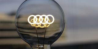 Light bulb with glowing Audi logo inside