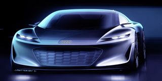 modern blue audi in front of a dark background