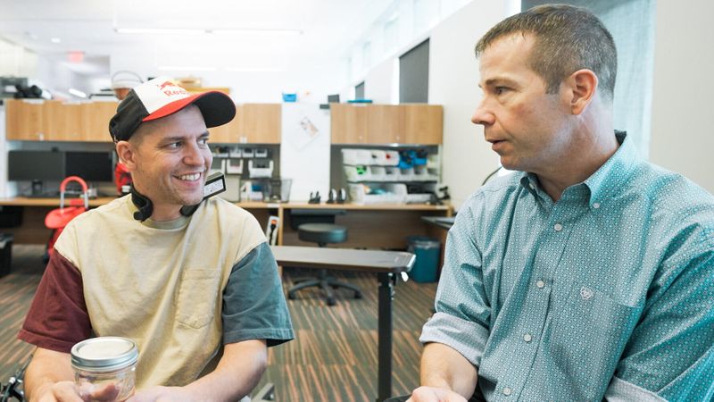 Dr. Michael Kilgard showing David “GrandPooBear” Hunt the vagus stimulation tasks involving carefully developed video games.