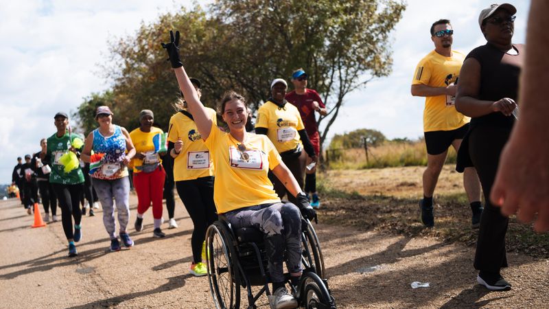 Participants run during the Wings for Life World Run App Run in Pretoria, South Africa on May 4, 2025.