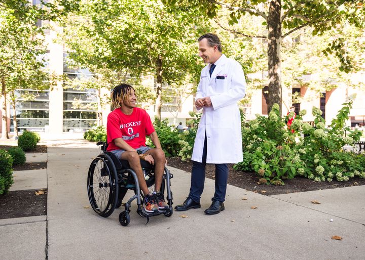 Justin (left) has been paralysed from the neck down since an accident. He is now part of a clinical trial led by Prof. Dr Dr Jan Schwab (right).