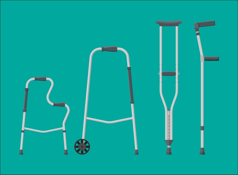 Illustration of mobility aids including a quad cane, walking frame and crutches on a teal background