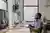 A happy man at a desk in front of a computer. (Image: RDNE Stock project/Pexels)