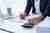 how do financial advisers make money