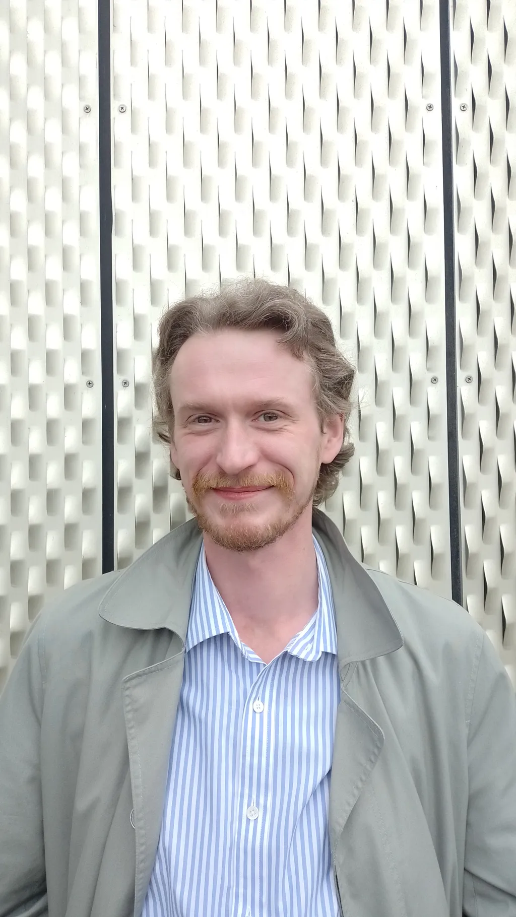 headshot of Thomas