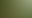 Person in a yellow rain poncho hiking on a misty forest trail, holding a selfie stick, surrounded by lush greenery.