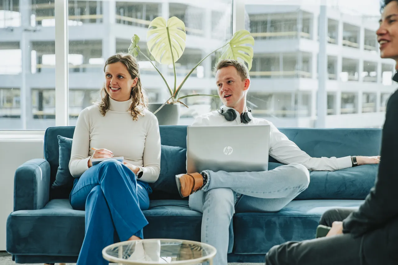 Emilia and Valentijn sitting in office Antwerp.