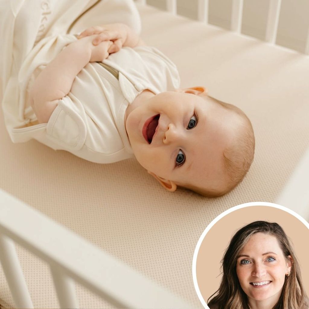 A smiling baby lies in a crib, wearing a cream outfit. Inset shows a portrait of a woman with long brown hair and a light background.