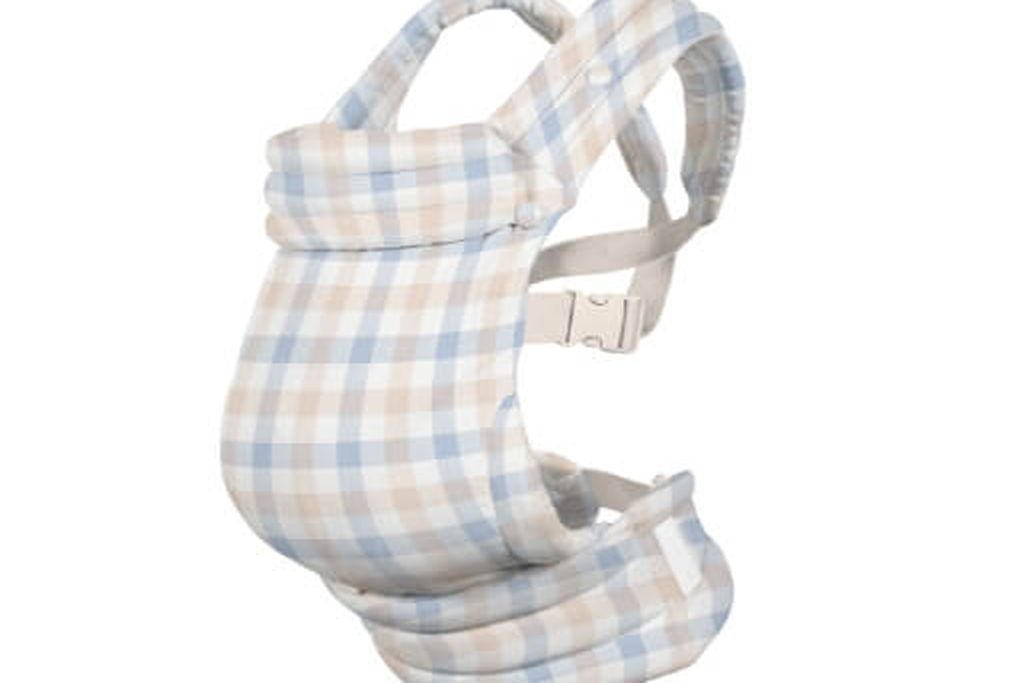 Plaid baby carrier with blue, beige, and white checkered pattern and adjustable straps against a white background.