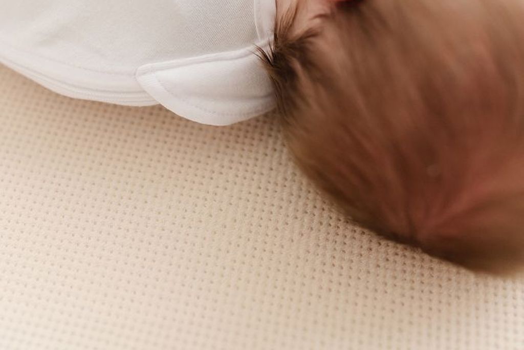 baby sleeping in a tencel swaddle bag