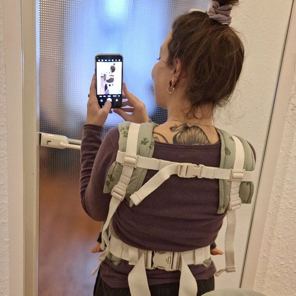 Selfie with a green Fidella Full Buckle baby carrier