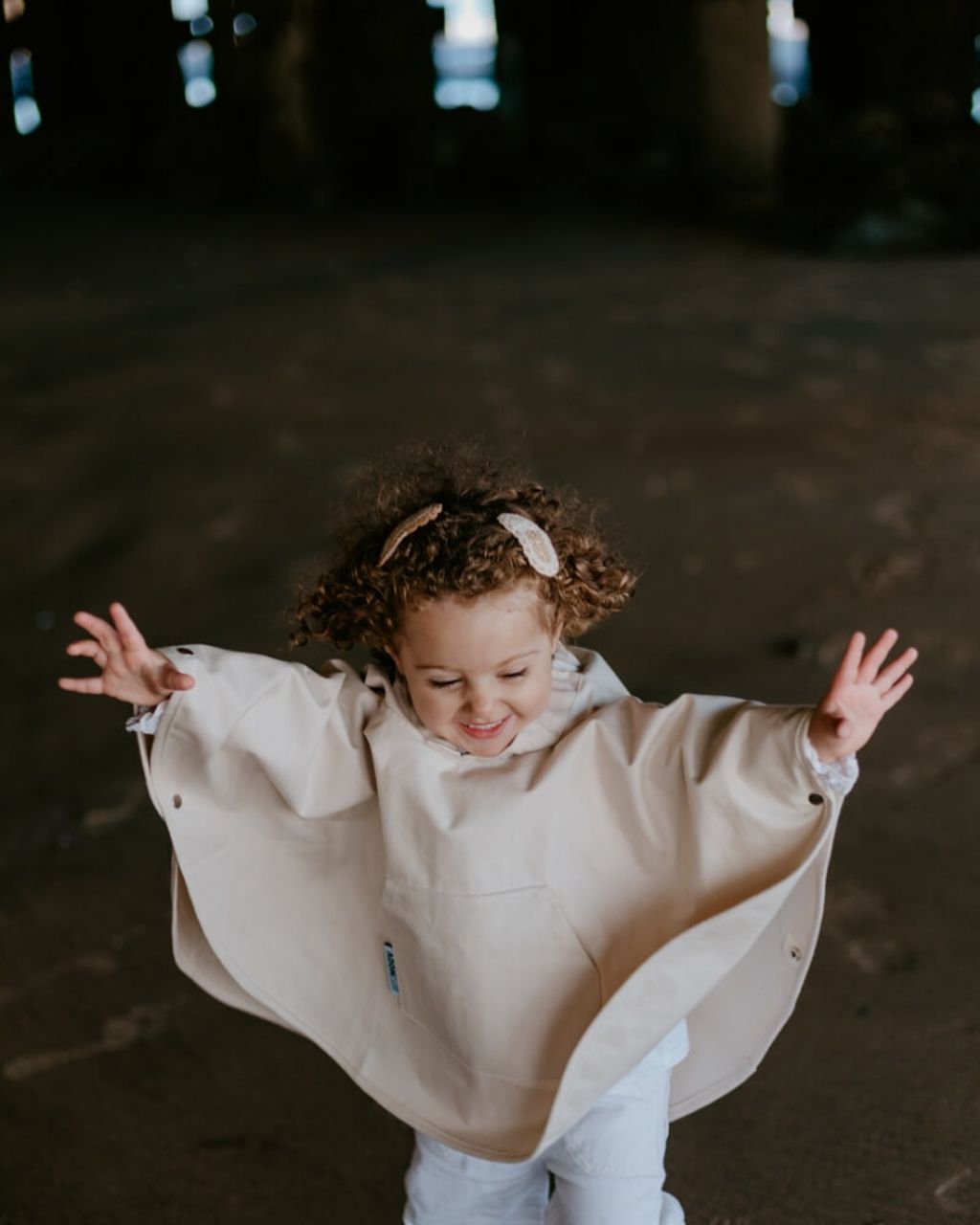 Toddler in Rainponcho