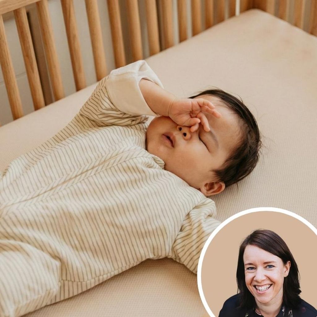A baby in striped pajamas sleeps in a crib, hand resting on face. Inset shows a woman smiling with a light brown background.