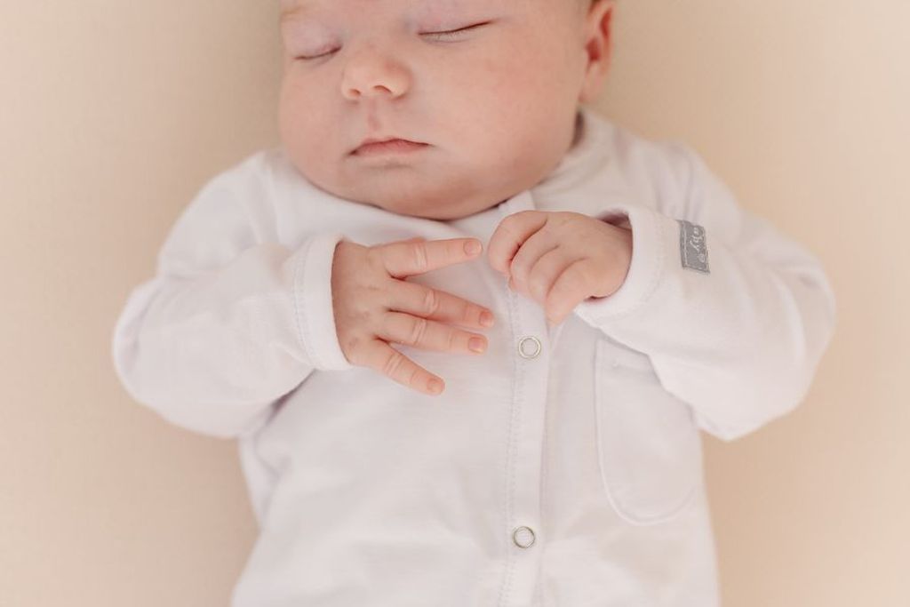 Baby sleeping wearing a pyjama