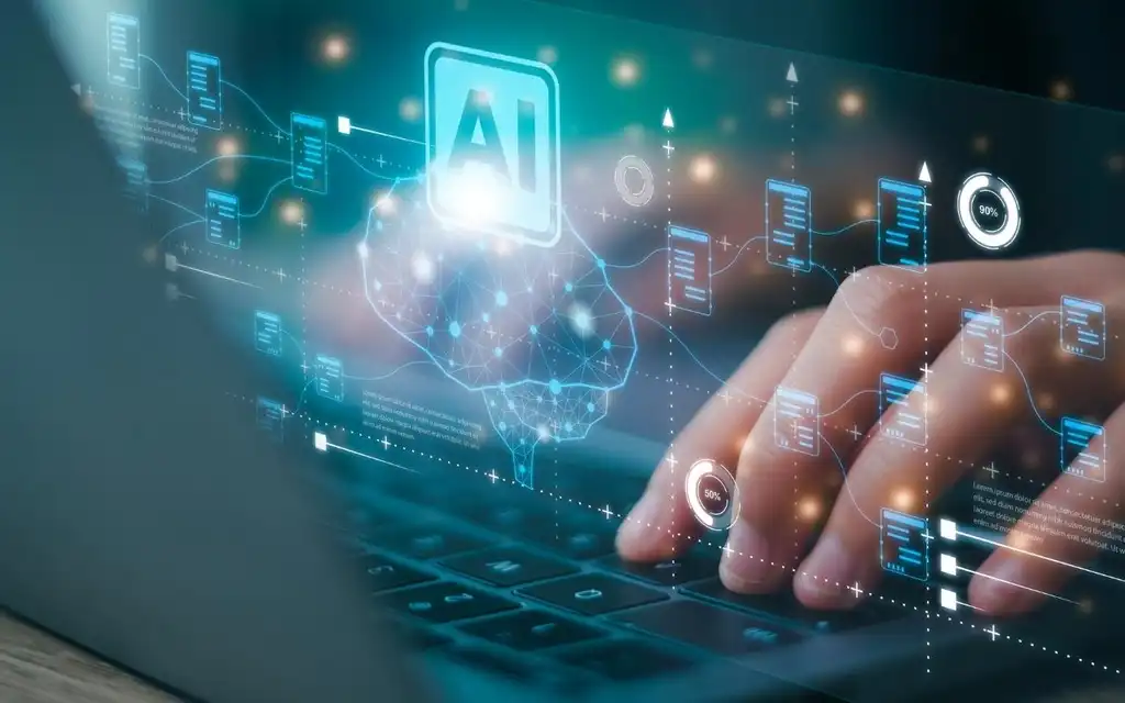 Hands typing on laptop keyboard with AI symbols in the air