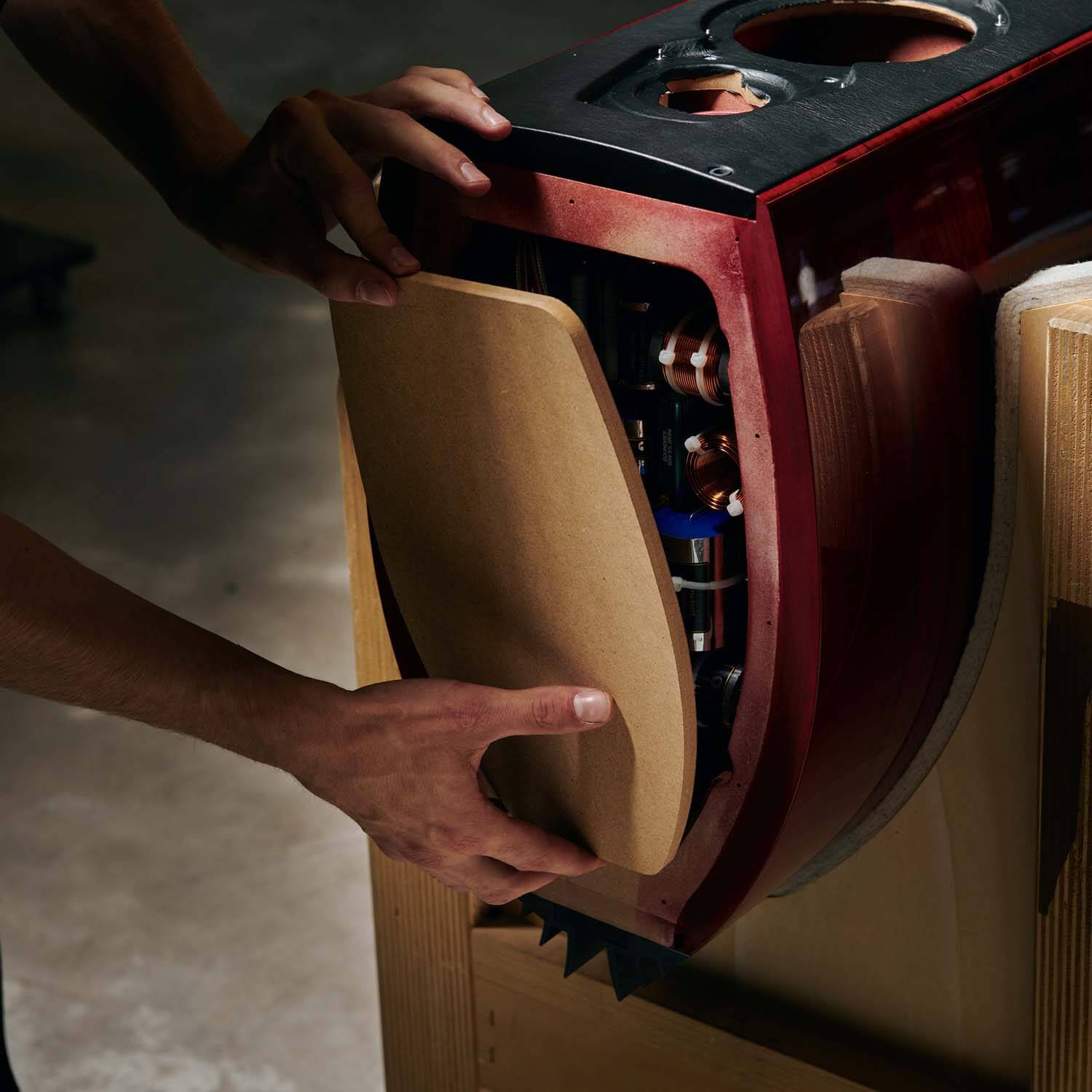 Sonus faber's Italian craftsman meticulously handcrafting the Serafino G2 speakers in Red Wood finish.