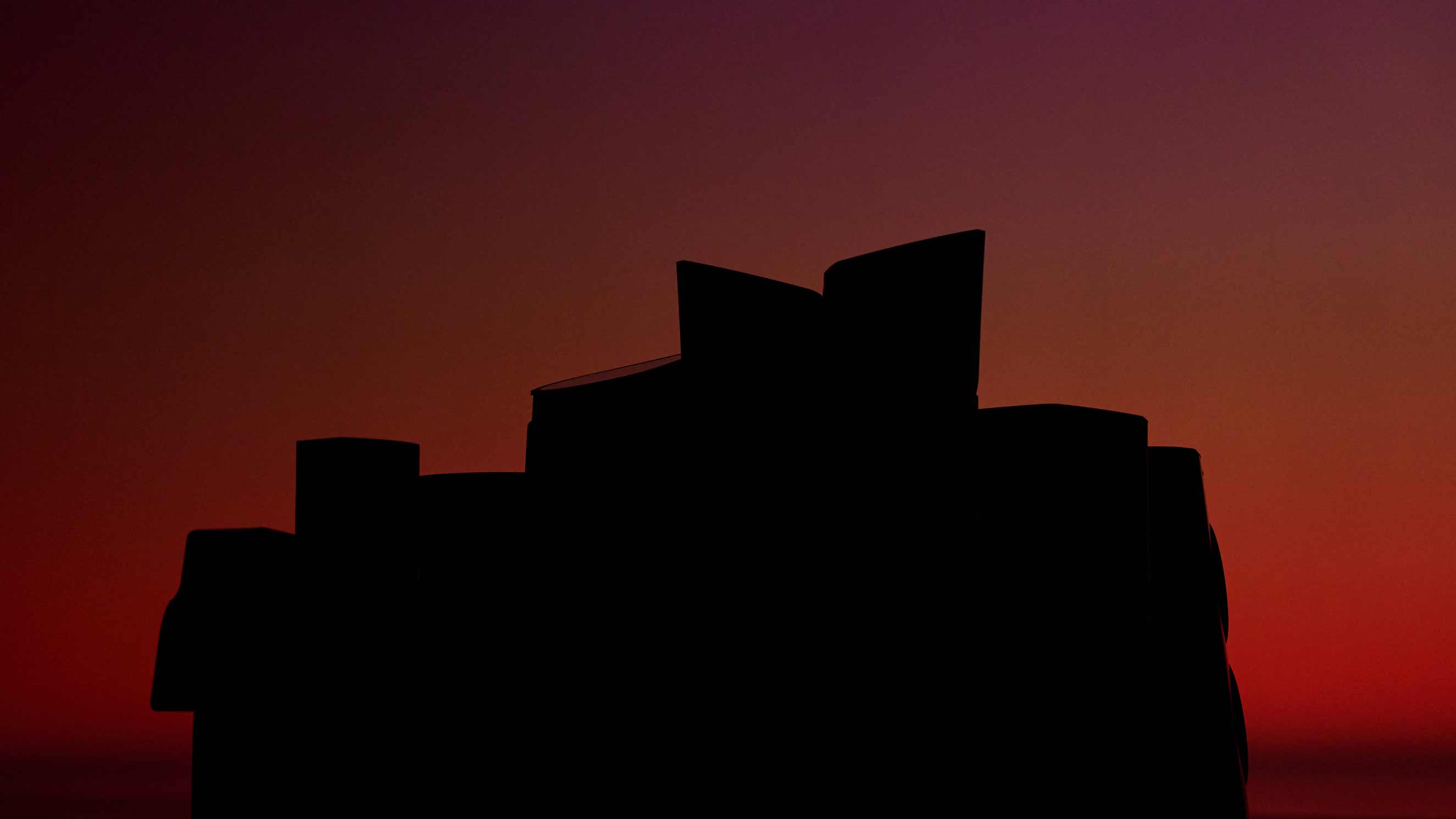 A backlit silhouette of the Sonus faber Suprema set