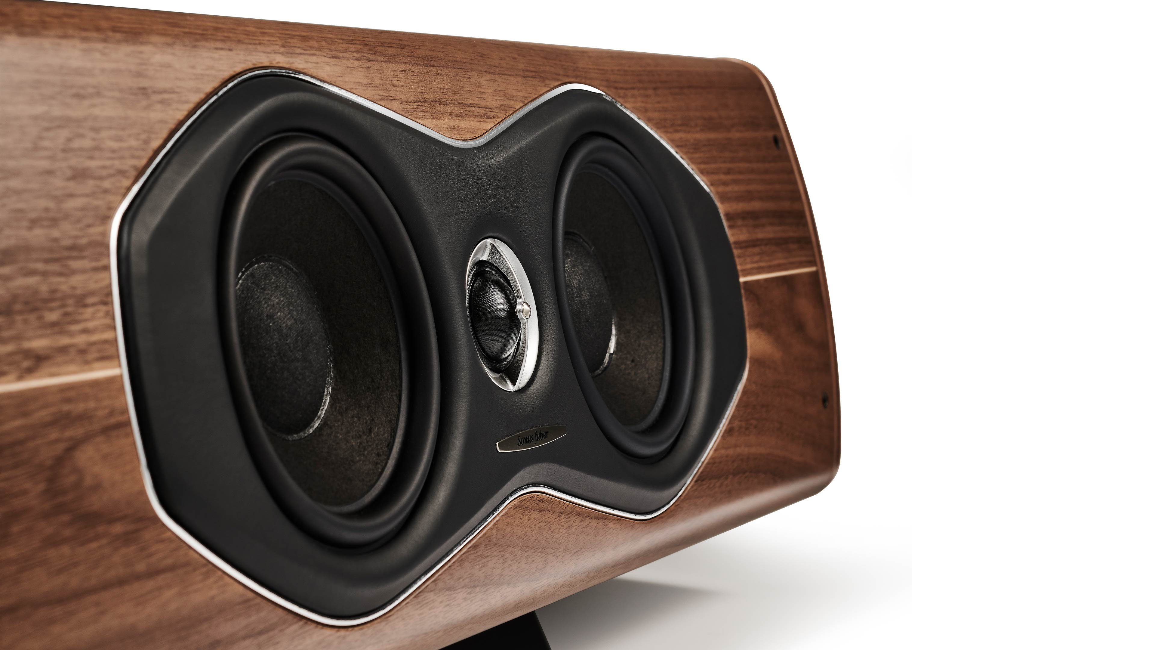 A close-up of the Sonus faber Olympica Nova CI center channel speaker in Walnut wood, Italian leather finishes.