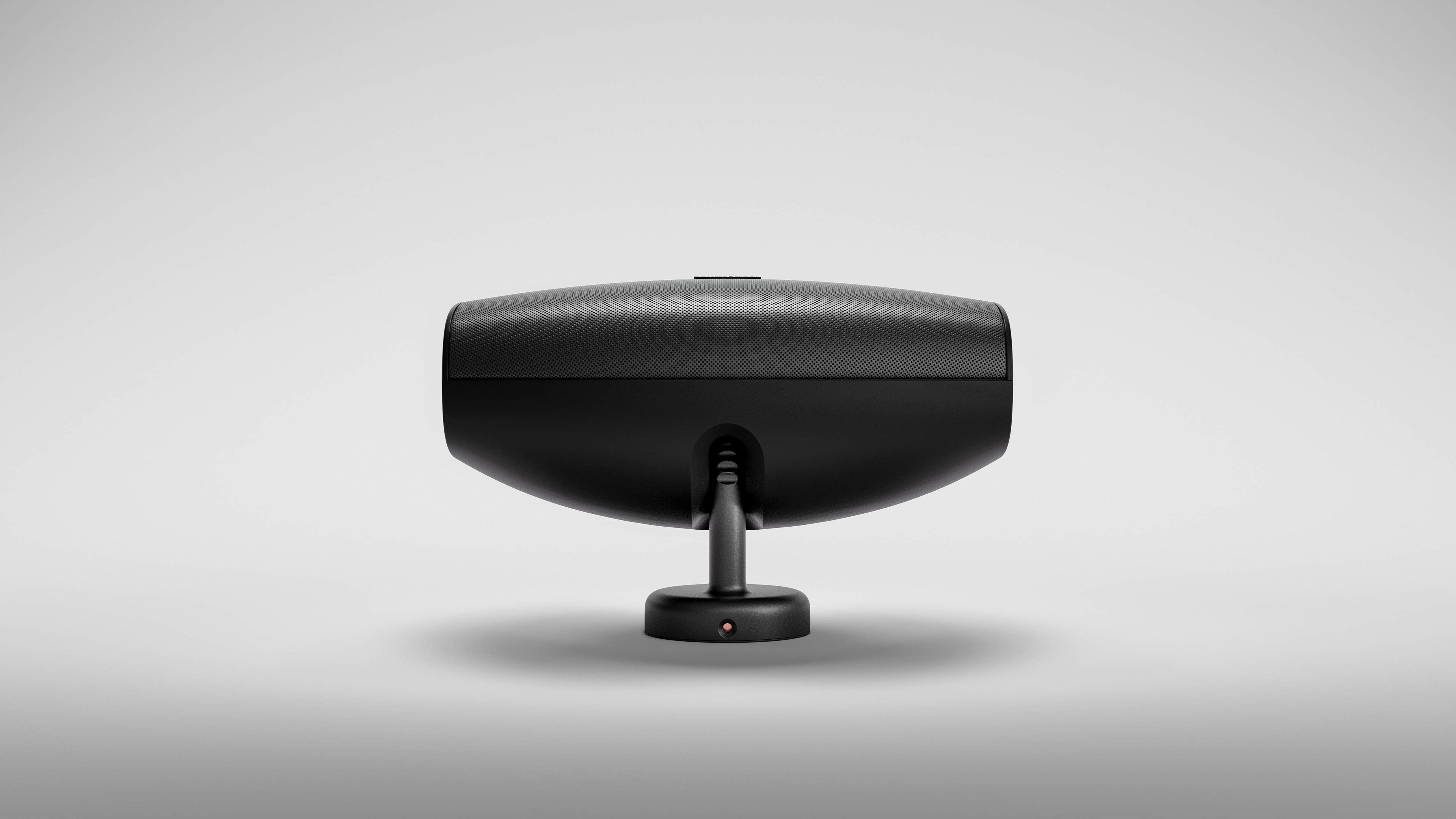 Sonus faber Aster outdoor speaker in black, ready for custom installation, showcasing a unique and clean design.