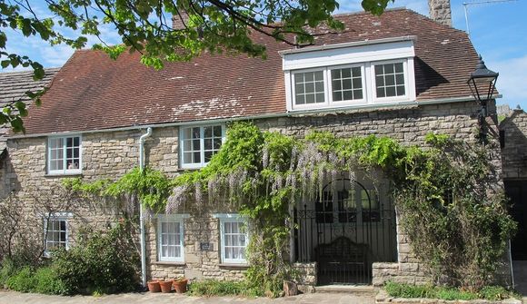 cottage with wisteria