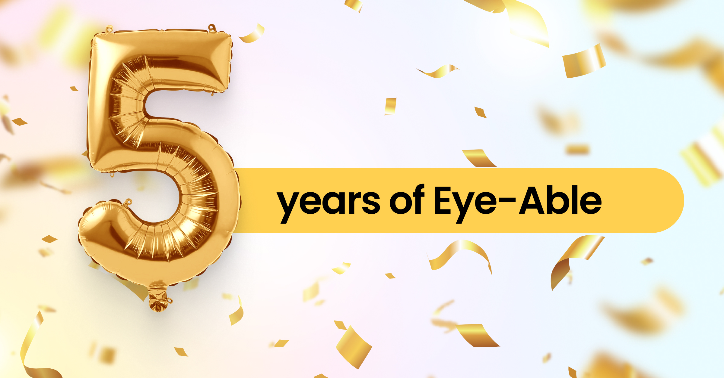 Golden ballon in the shape of a five marking the 5 year anniversary of Eye-Able