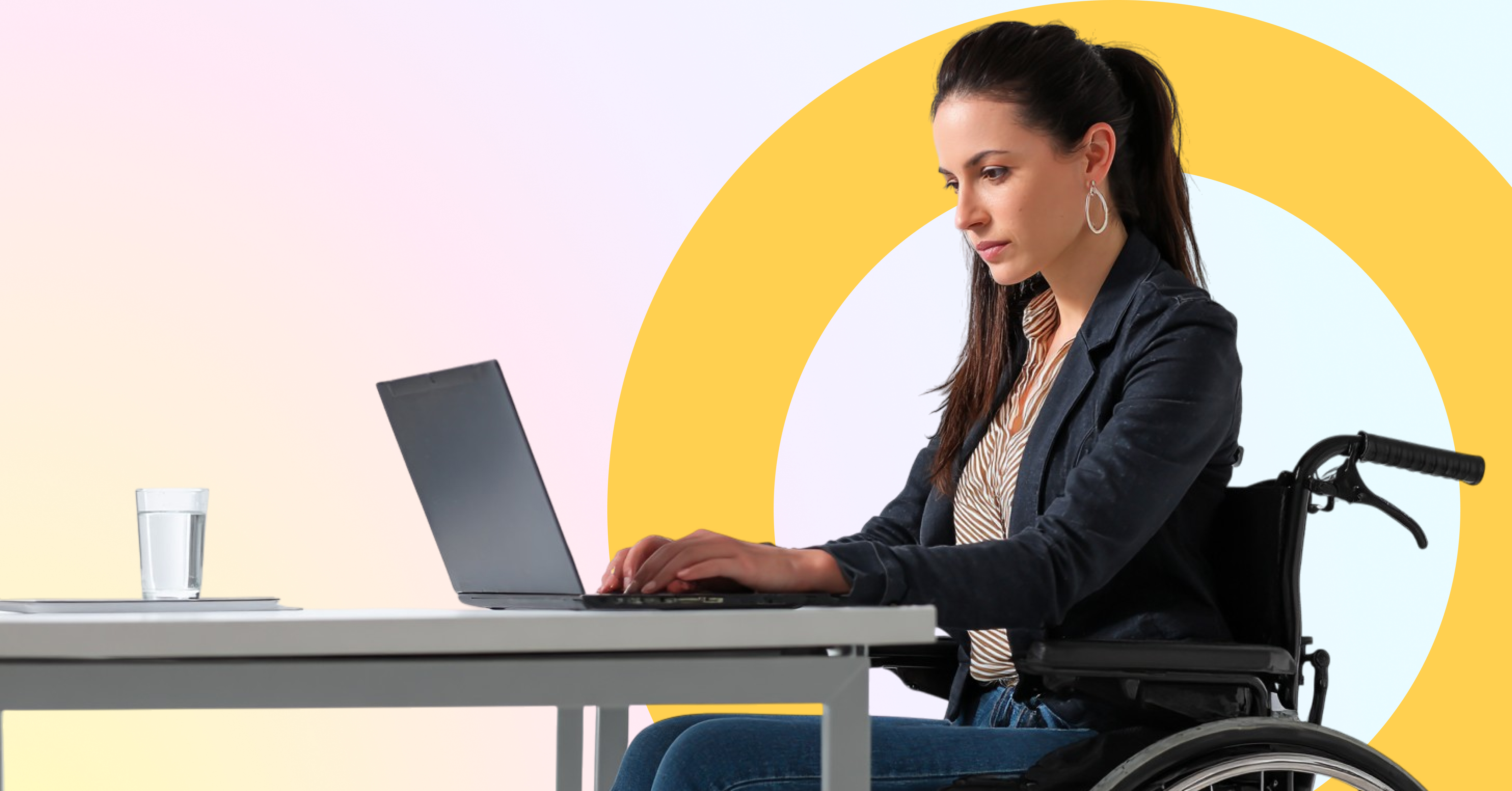 woman in wheelchair on laptop