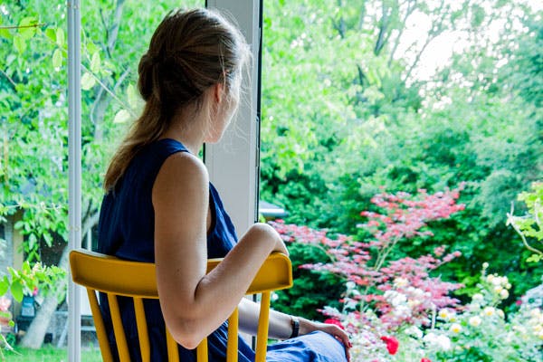 Axanne sitting on chair